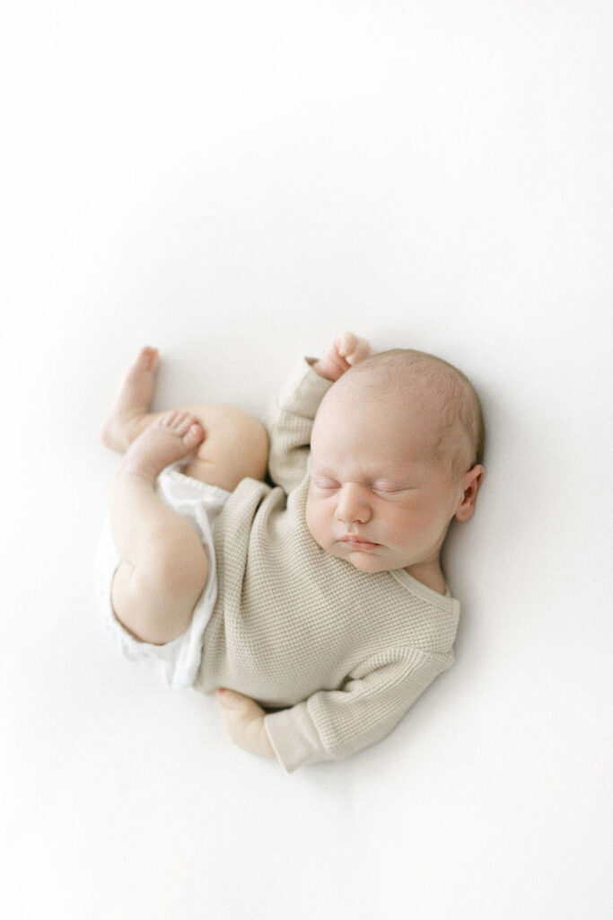 oft neutral outfit inspiration for families wondering what to wear for newborn photos.